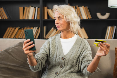 Young woman using mobile phone