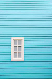 Full frame shot of blue window of building