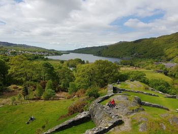 High angle view of green landscape against sky