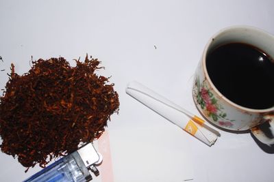 Close-up of coffee cup on table