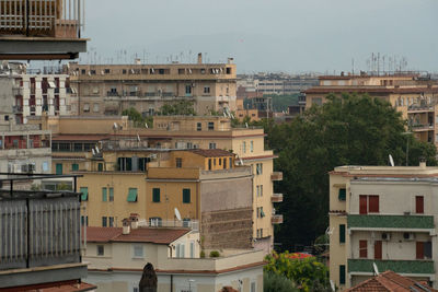 High angle view of residential buildings against sky