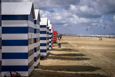 Panoramic view of  beach cabin against sky