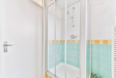 Empty shower cubicle in bathroom