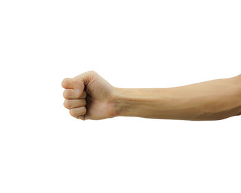 Close-up of human hand against white background