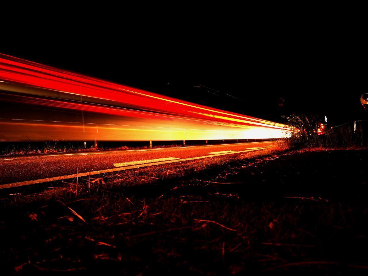 BLURRED MOTION OF TRAIN AT NIGHT