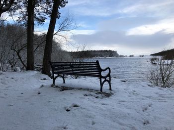 Scenic view of landscape against sky during winter