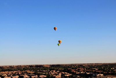 Hot air balloons flying in sky