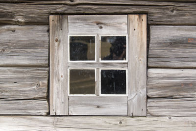 Window on log cabin