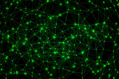 Full frame shot of illuminated green abstract connections