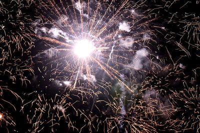 Low angle view of firework display