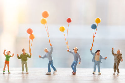 Close-up of figurines on table at home