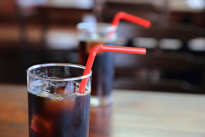 Close-up of drinks served on table at cafe