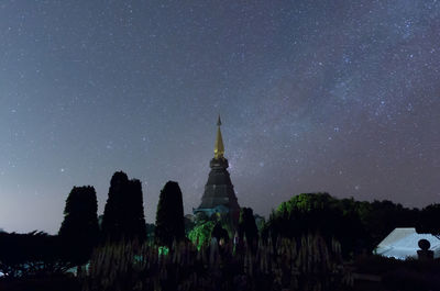 Low angle view of temple against sky at night