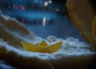 High angle view of yellow paper on table