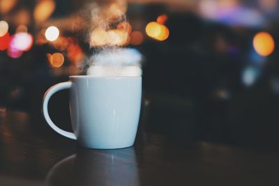 Close-up of coffee cup on table