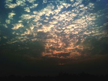 Low angle view of dramatic sky during sunset