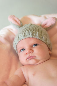 Close-up of cute baby girl wearing rabbit hat