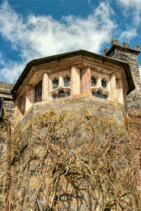 Low angle view of old building against sky