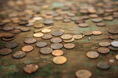 High angle view of coins on table