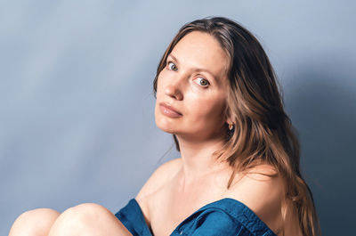 Portrait of woman head turned sideways up, close-up.