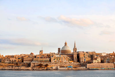 Early winter morning in valletta, malta. cathedral and other historical buildings. panorama view.