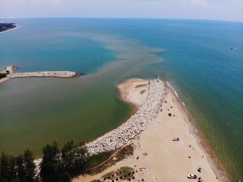 High angle view of sea shore against sky