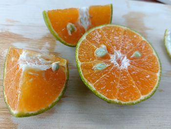 Close-up of orange slices on table