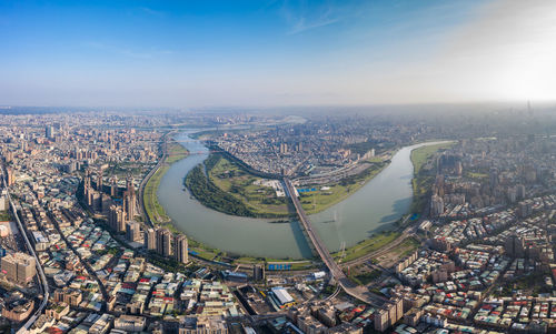 High angle view of city buildings against sky