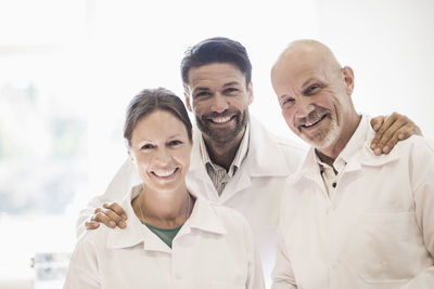 Portrait of happy engineers in industry