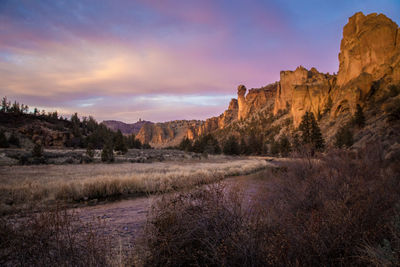 Scenic view of landscape against sky during sunset