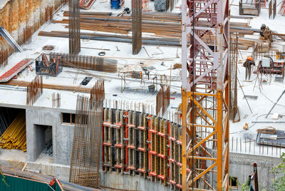 Construction site background with armature, columns,. arrangement of the foundation of a building.