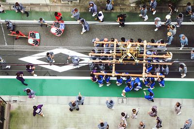 Group of people on tiled floor