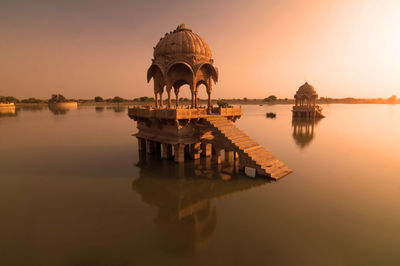 Panoramic view of lake against sky during sunset