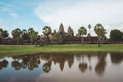 Reflection of temple and strees in lake