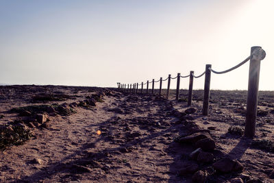 Scenic view of beach against clear sky