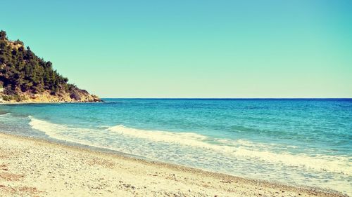 Scenic view of sea against clear sky