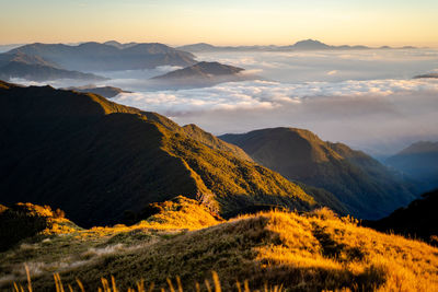 Scenic view of mountains against sky during sunset