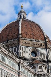 Low angle view of duomo santa maria del fiore against sky