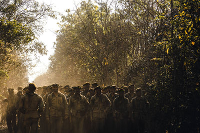 Army soldiers walking in forest