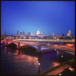 Bridge over river at night