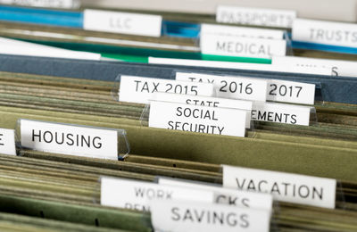 Close-up of documents arranged in drawer