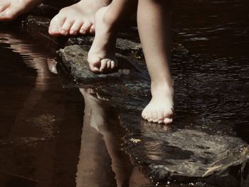 Woman standing in water