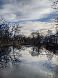 Scenic view of lake against sky during winter