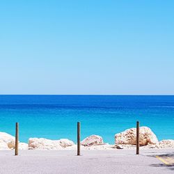 Scenic view of sea against clear blue sky