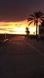 Silhouette of road at sunset