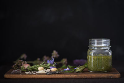 Close-up of food on table against black background