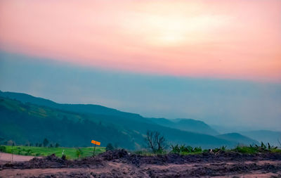 Scenic view of landscape against sky during sunset