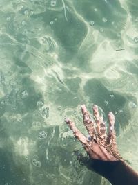 High angle view of man swimming in water