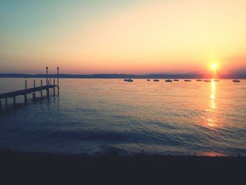 Scenic view of sea at sunset