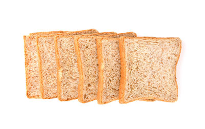 Close-up of bread against white background